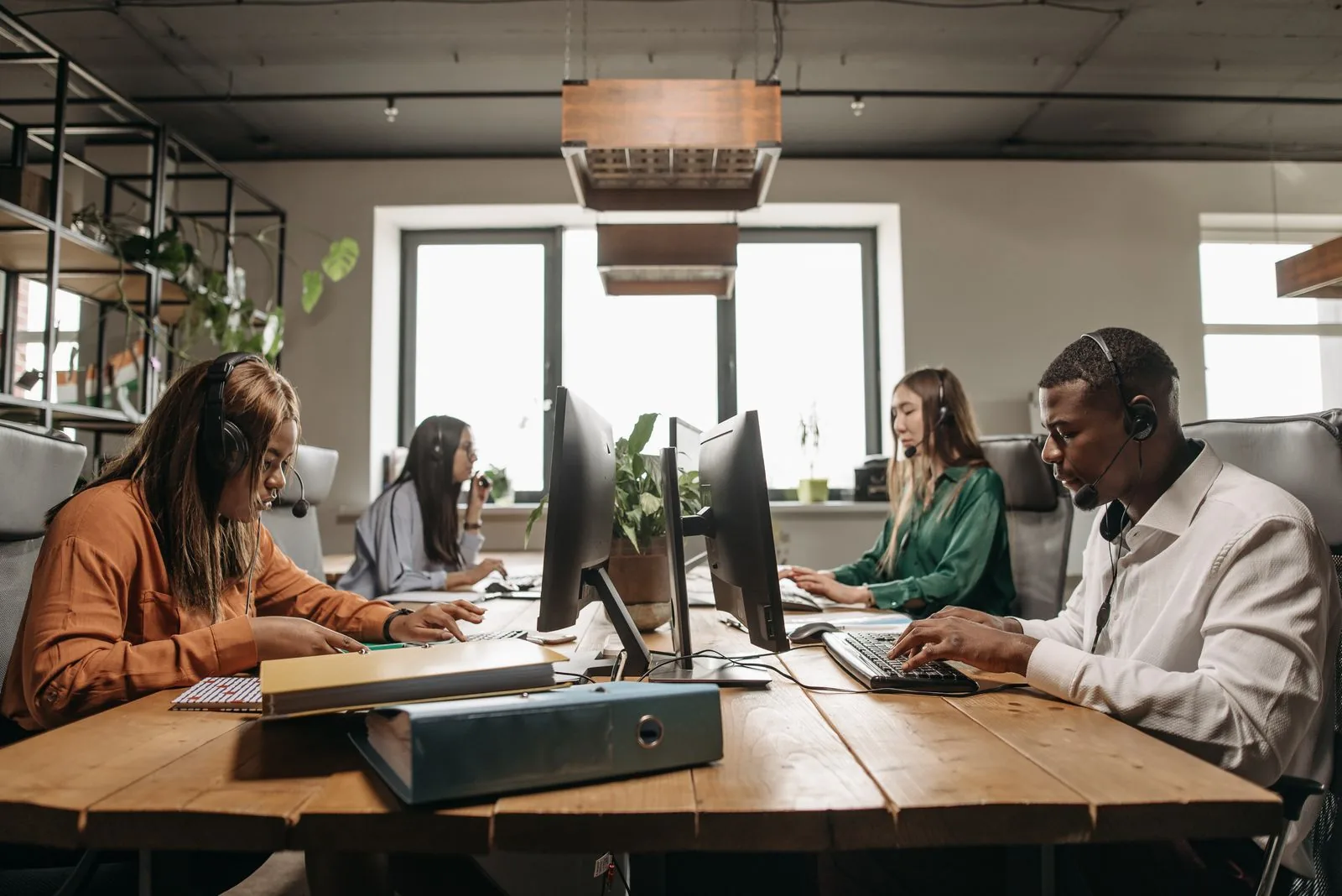 Finance team reviewing Oracle Fusion results in a modern office